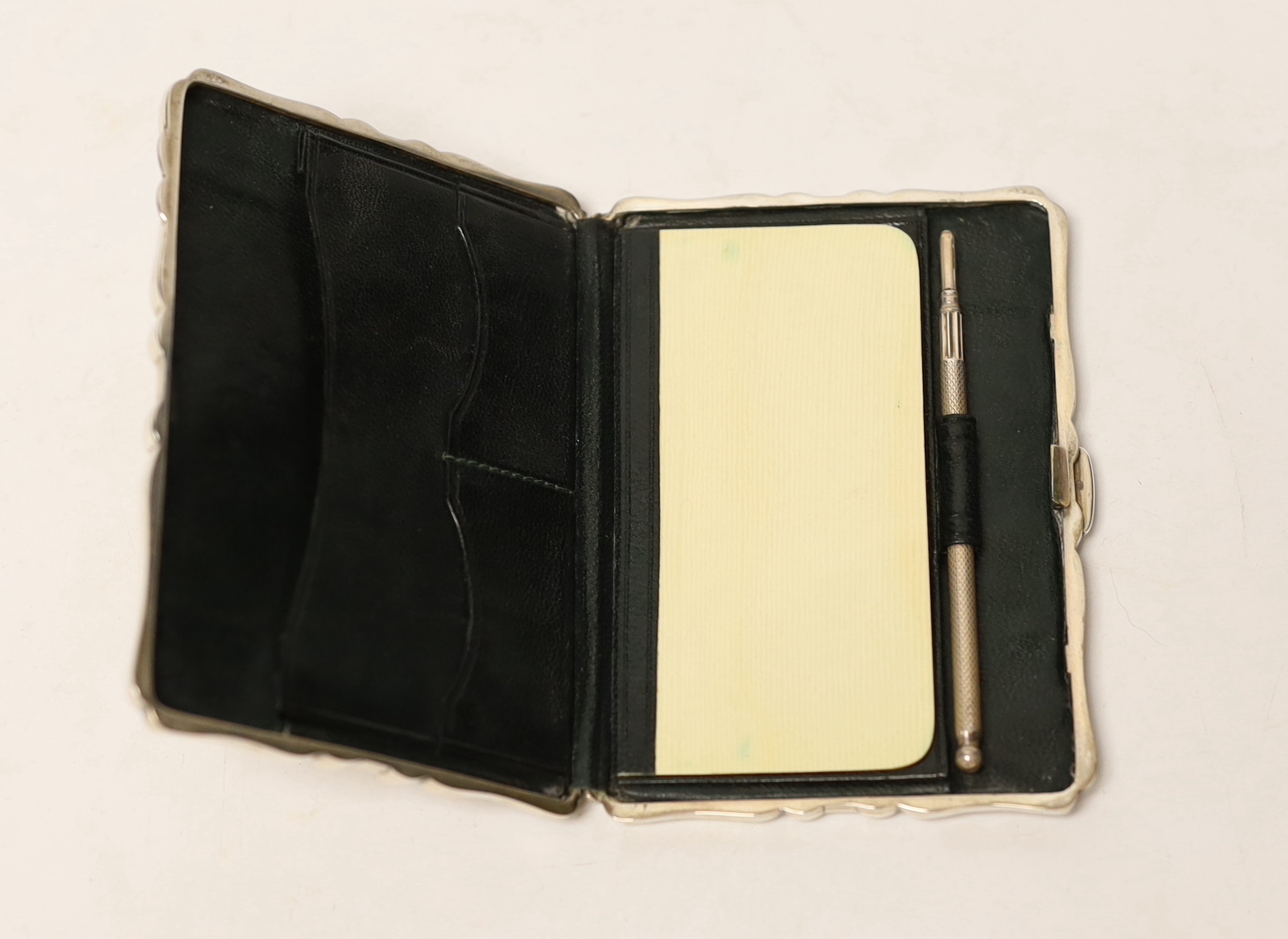 An Edwardian engraved silver card purse, Saunders & Shepherd, Birmingham, 1903, 9.8cm.